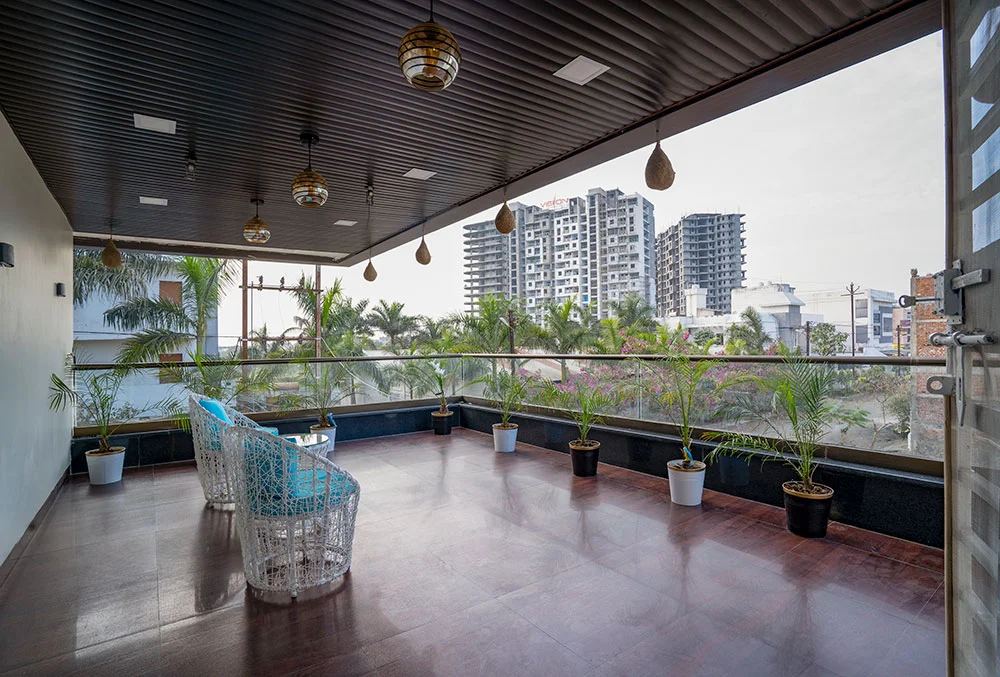 Covered terrace overlooking the city, The Pradeep Bungalow